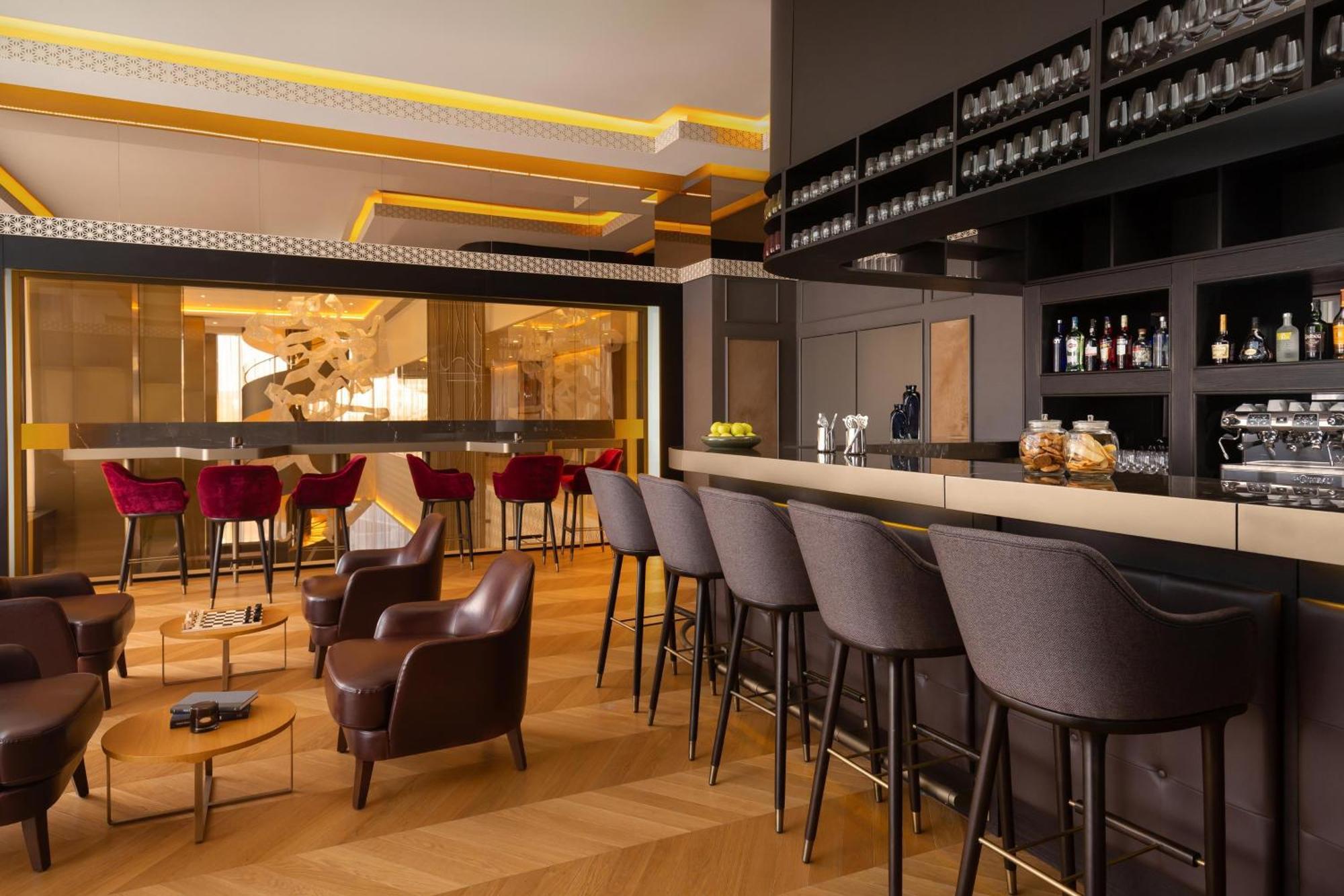 Sheraton Astana Hotel Exterior foto The bar at the 10118 Otto Kunz